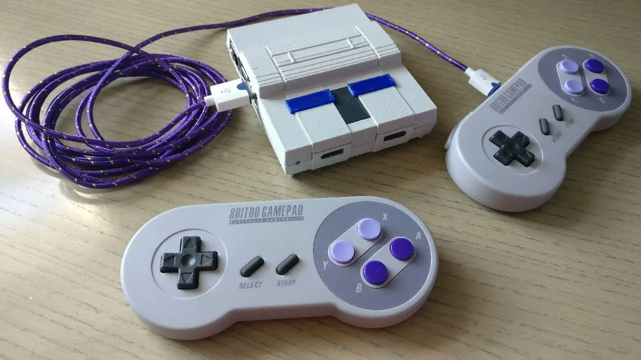 Raspberry Pi 3 in a 3D printed SNES case with 8Bitdo SNES30 controllers